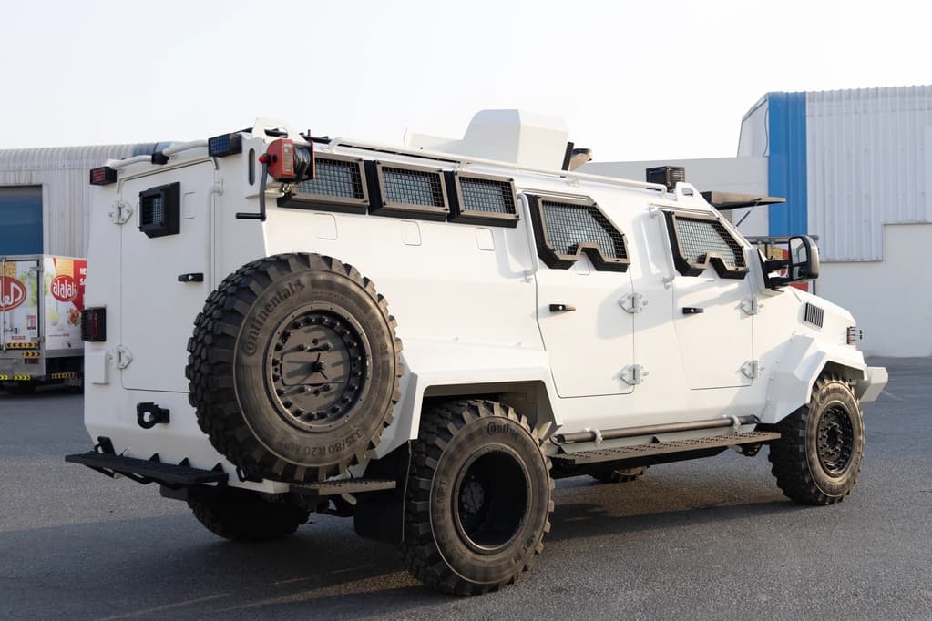 APC Shark White armored personnel carrier right side spare tire view