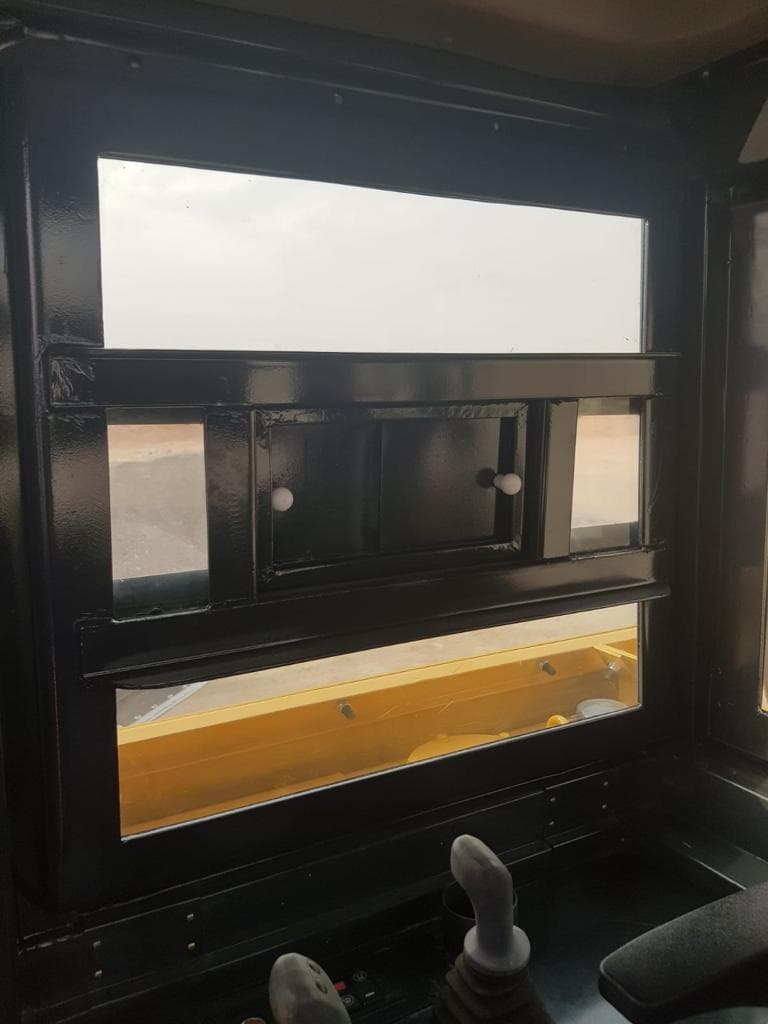 Excavator 320 BR7 armored cabin interior window view