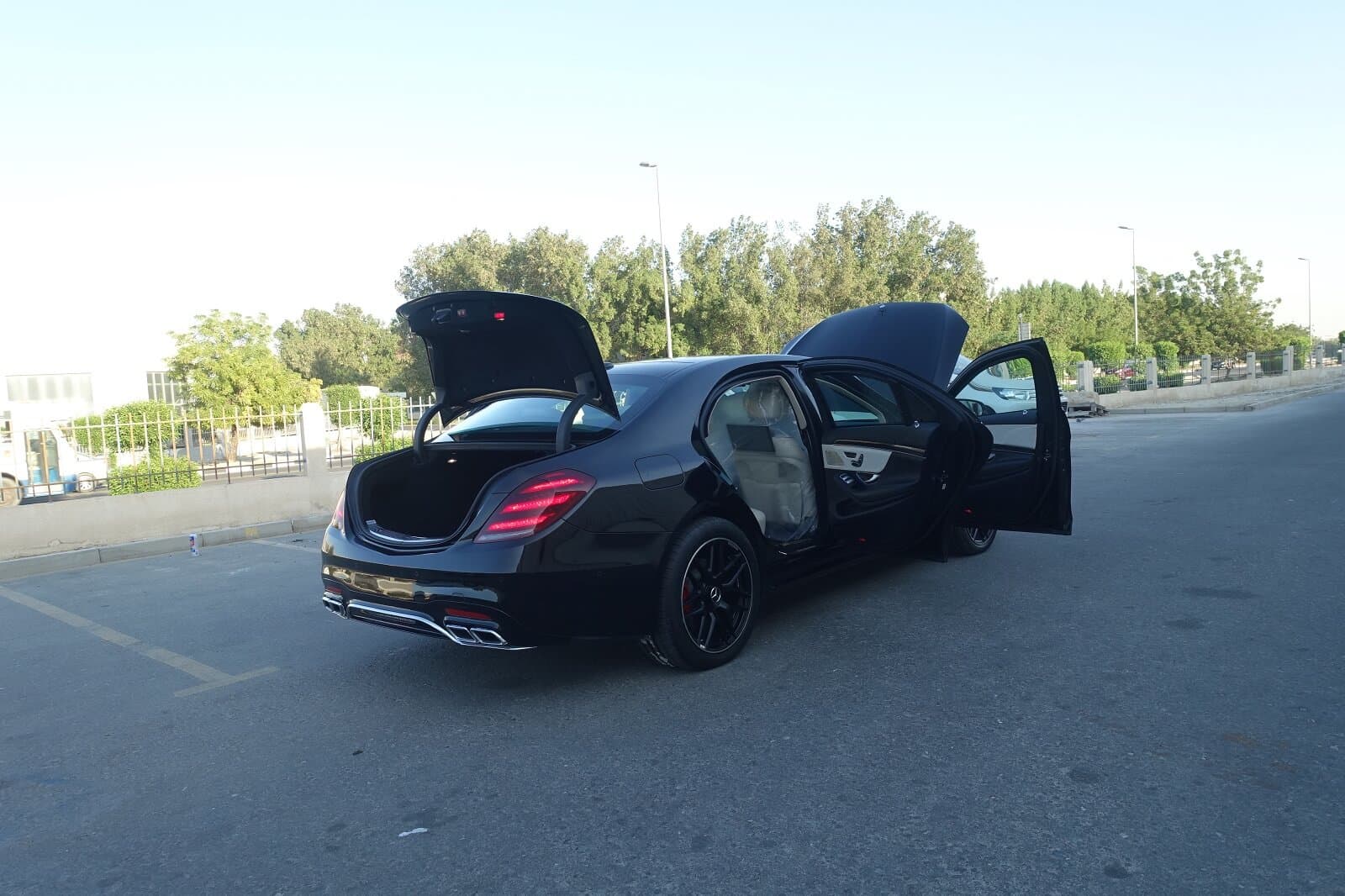 Mercedes S63 AMG armored luxury sedan rear right view with doors open