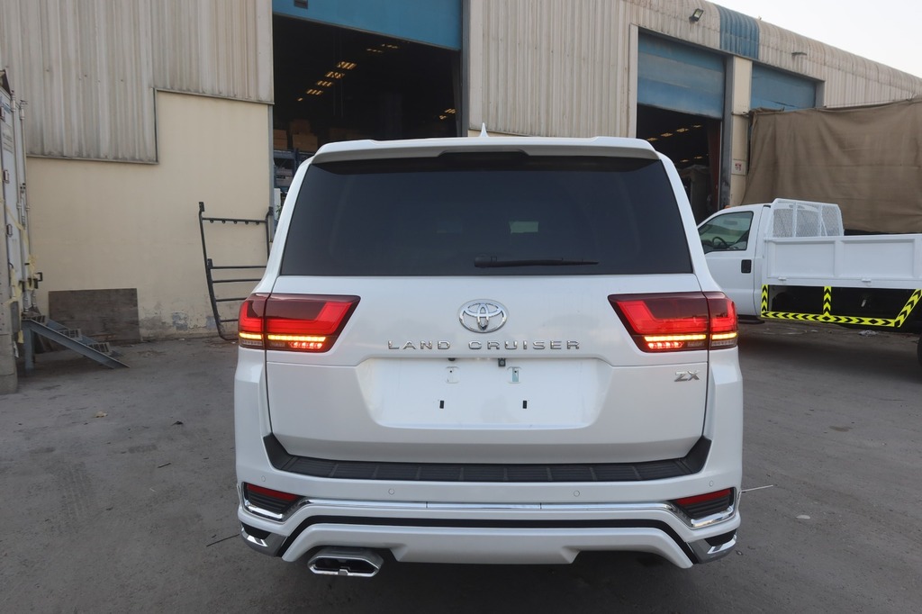 Toyota Land Cruiser ZX rear view with LED taillights and pearl white finish