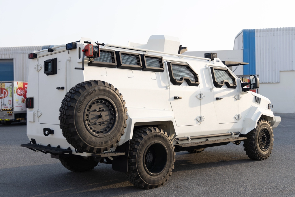 APC Shark White armored personnel carrier right side spare tire view