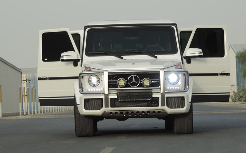 Mercedes-Benz AMG G63 White armored SUV front doors open view