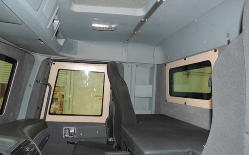 Armored Mercedes-Benz Actros cash transport interior seating view