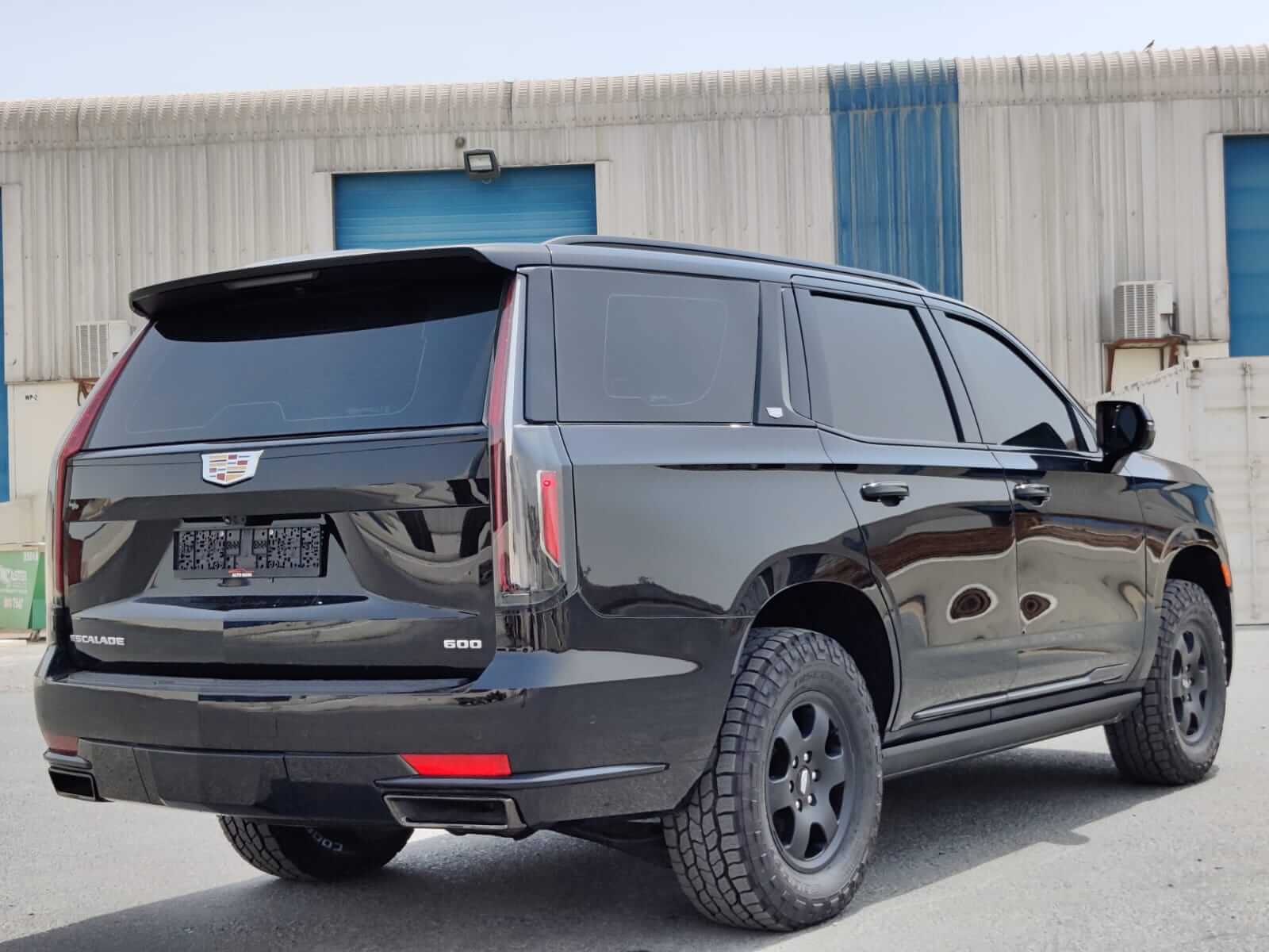 Cadillac Escalade armored luxury SUV rear exterior angle view