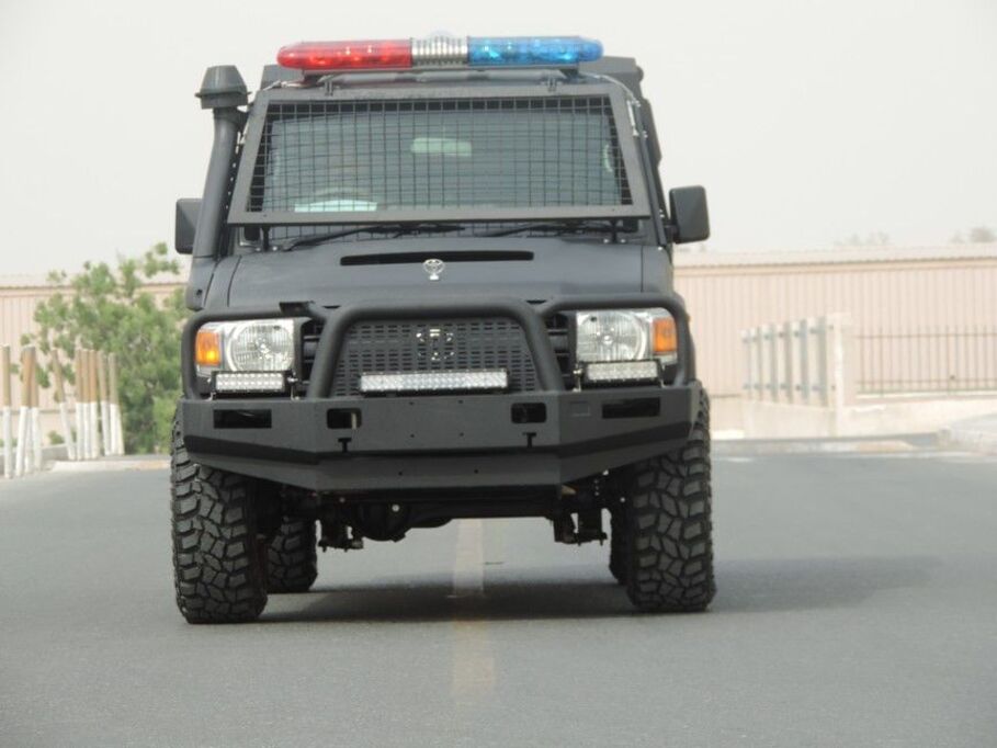 Front view of LC79 armored personnel carrier with bull bar and emergency lights
