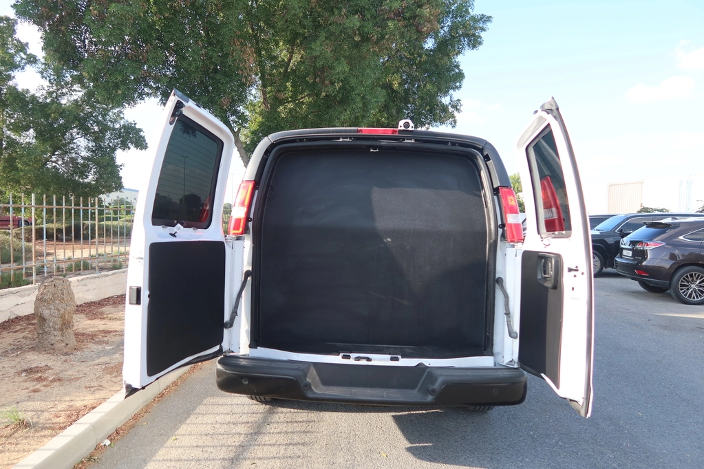 GMC SAVANA 6.7L - WHITE (CIT) - trunk open showcasing armor