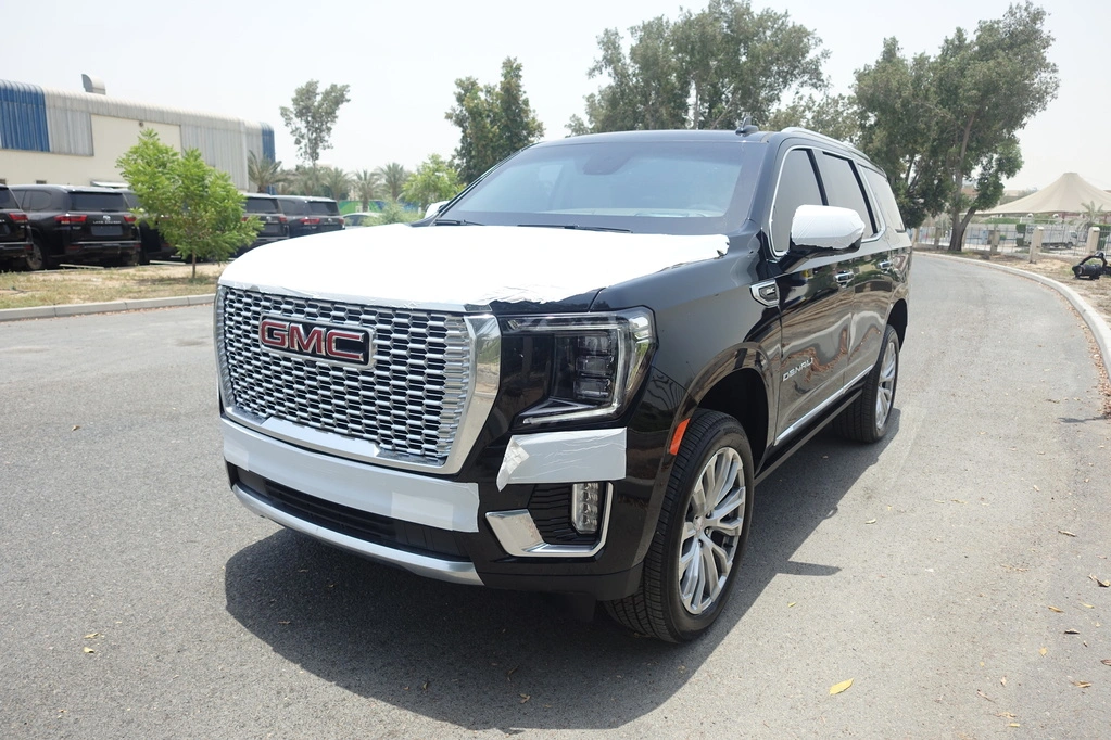 Black GMC Yukon Denali protected SUV in front view