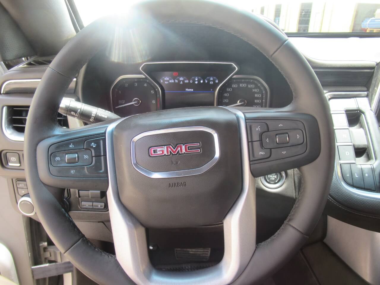 GMC Yukon steering wheel and dashboard view