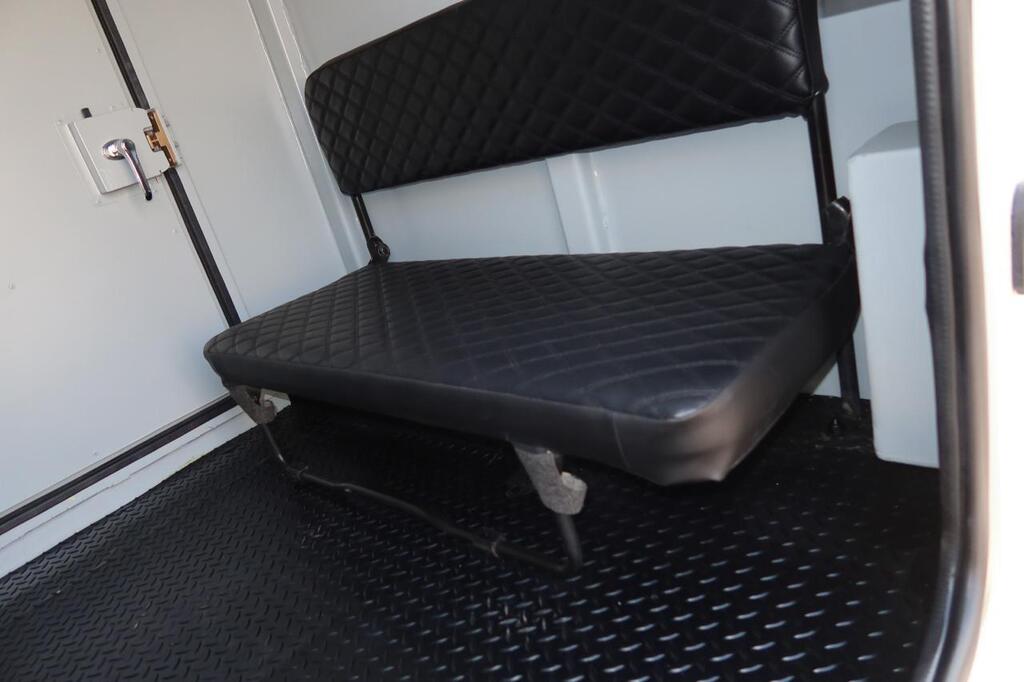 Interior bench seating in LC79 troop compartment with fold-down design