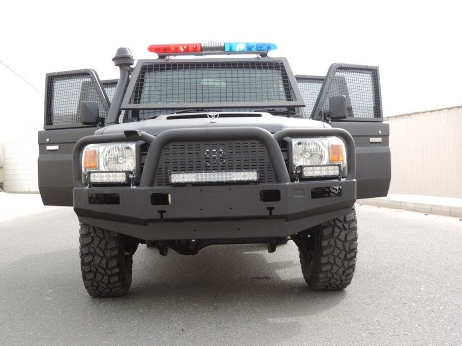 LC79 Troop Carrier with police lights and reinforced bumper guard