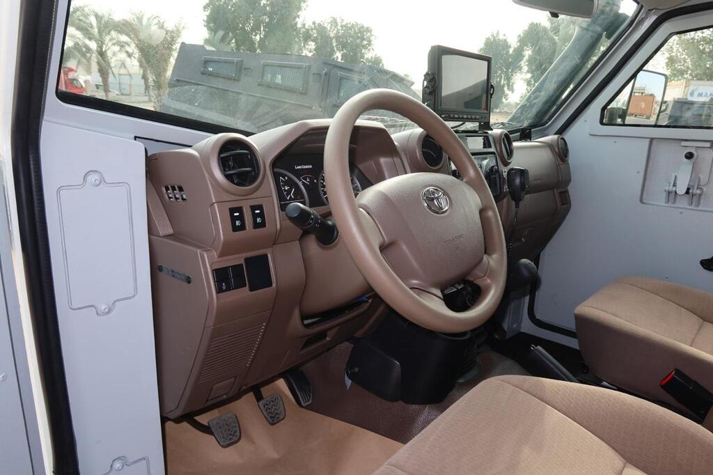Land Cruiser 79 beige interior with tactical communications equipment