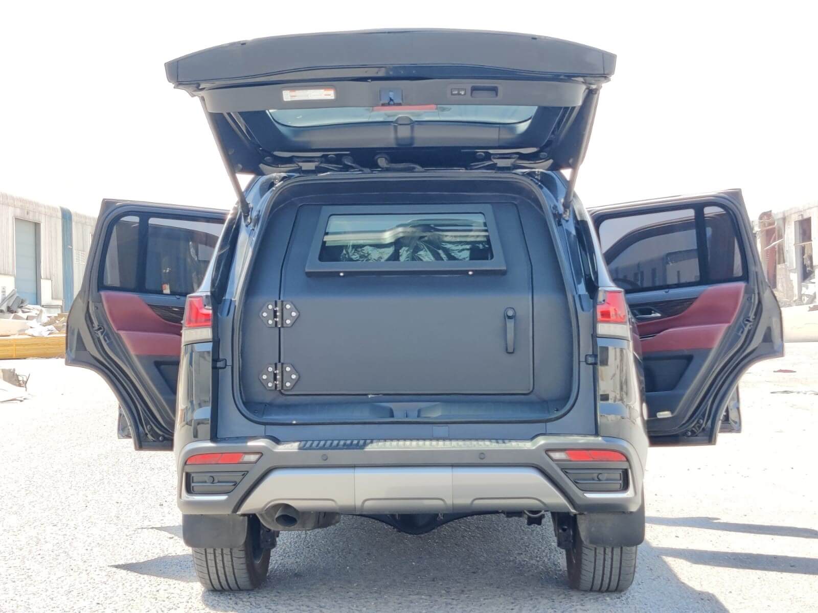 Lexus LX600 BR9 rear view with doors open and protected cargo area