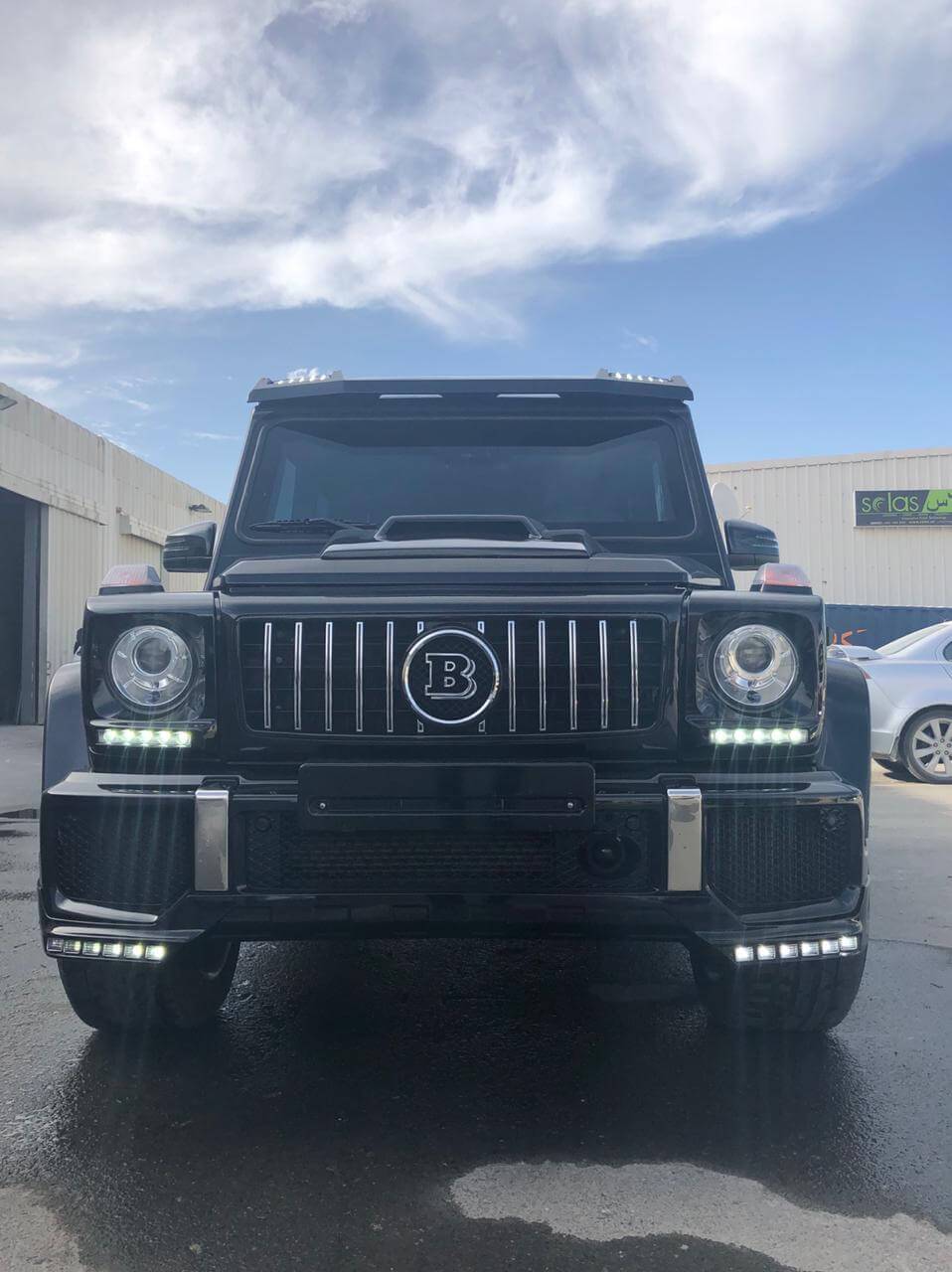 Mercedes-Benz G63 Brabus Black armored SUV front lights on view