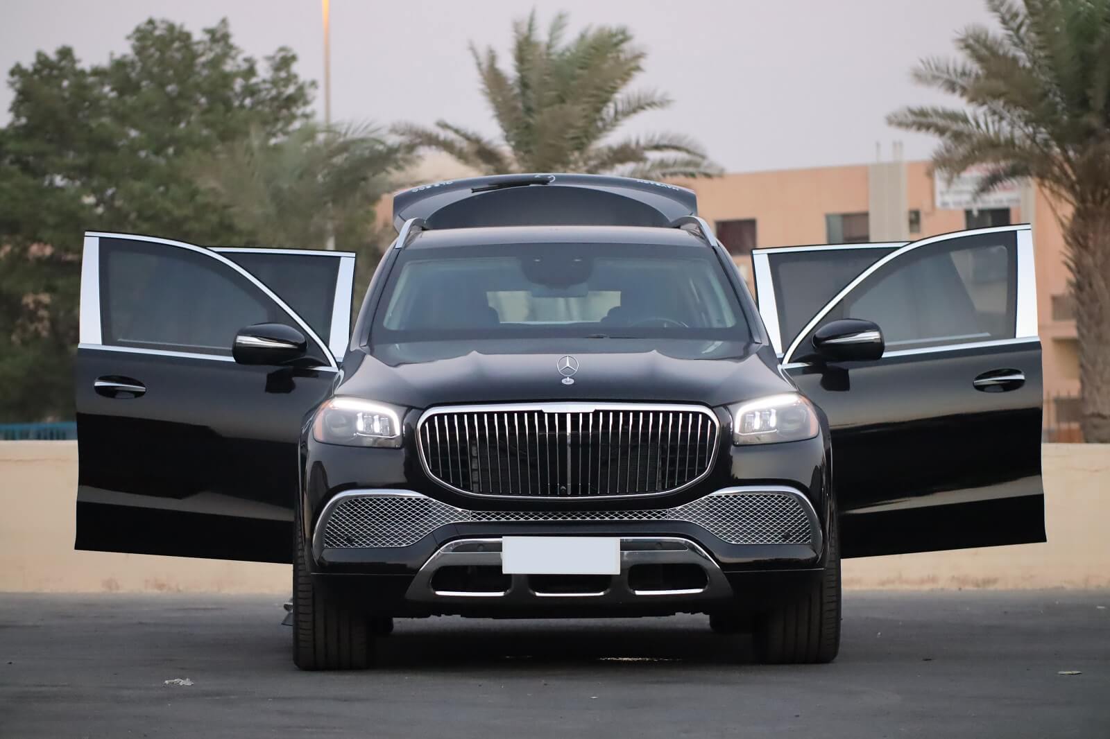 Mercedes Maybach GLS 600 armored luxury SUV front lights on doors open