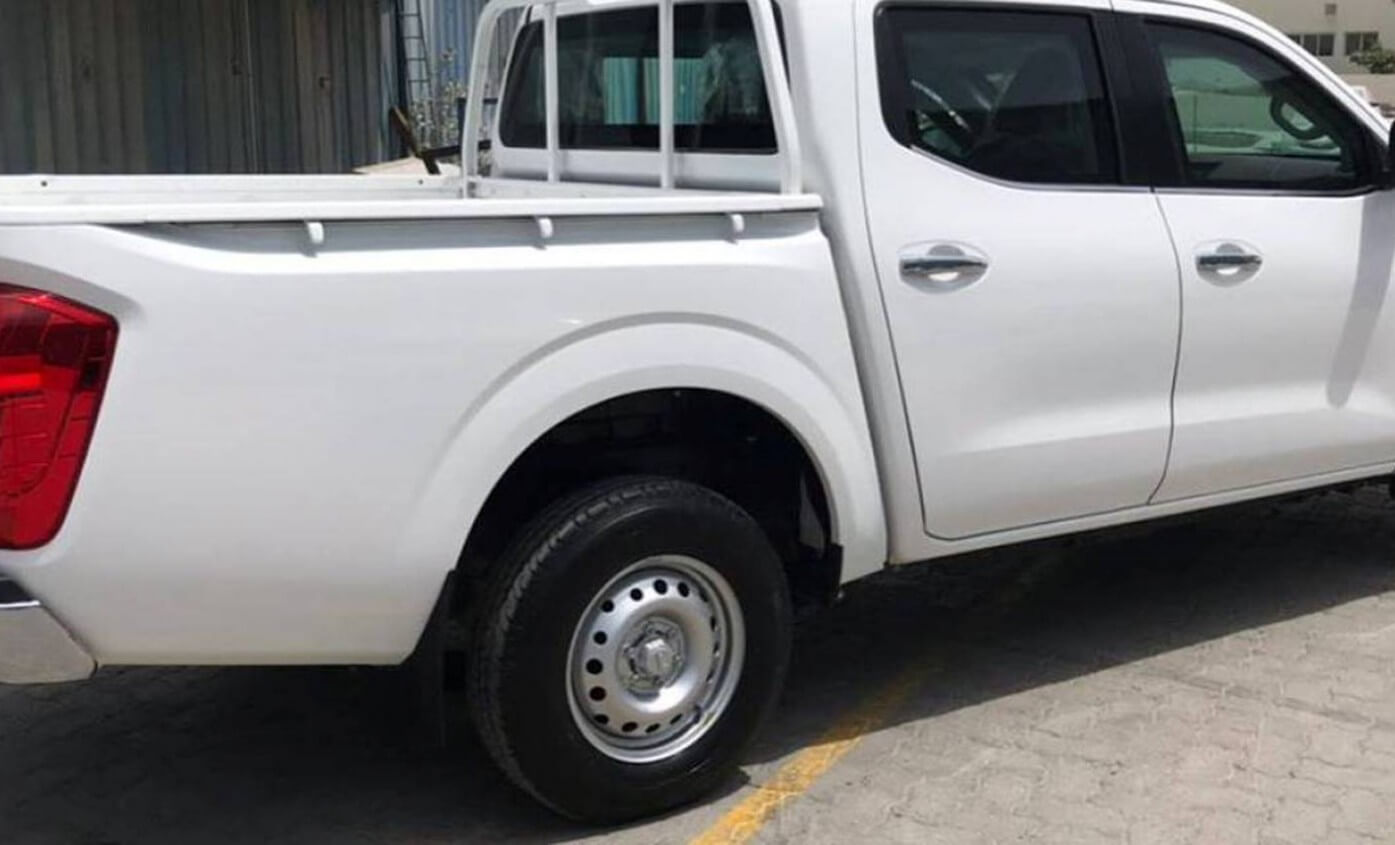 Nissan Navara armored pickup left side exterior view