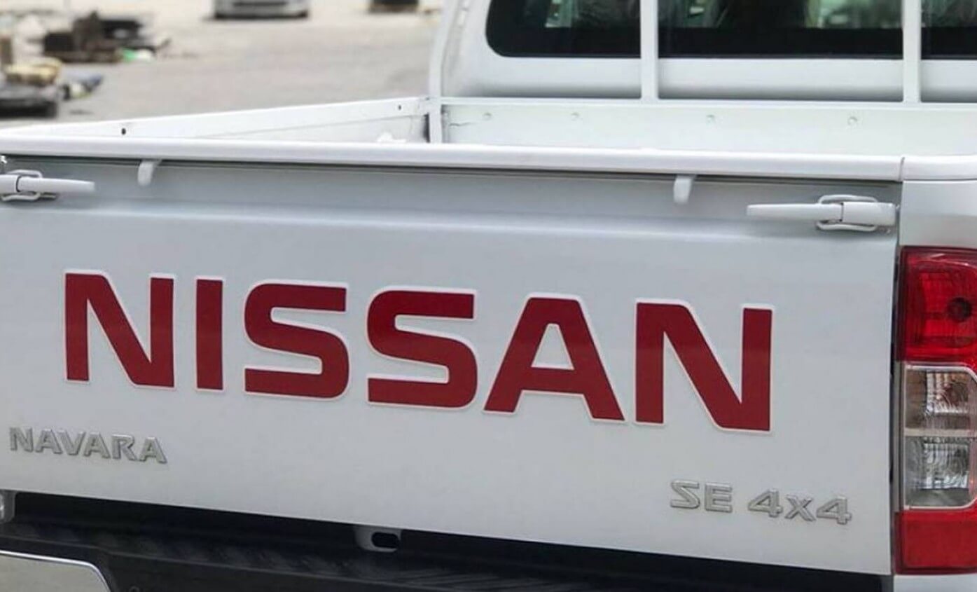 Nissan Navara armored pickup rear tailgate logo detail