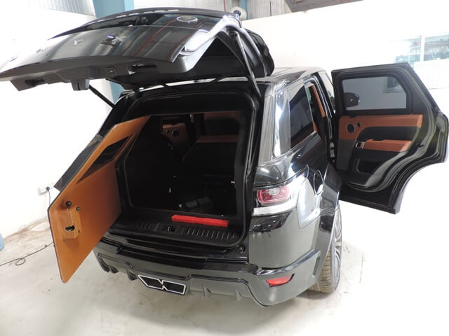 Range Rover Sport armored SUV open trunk armoring with side door open