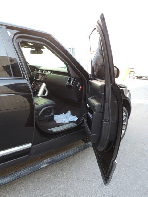 Range Rover Vogue armored luxury SUV right front door open view