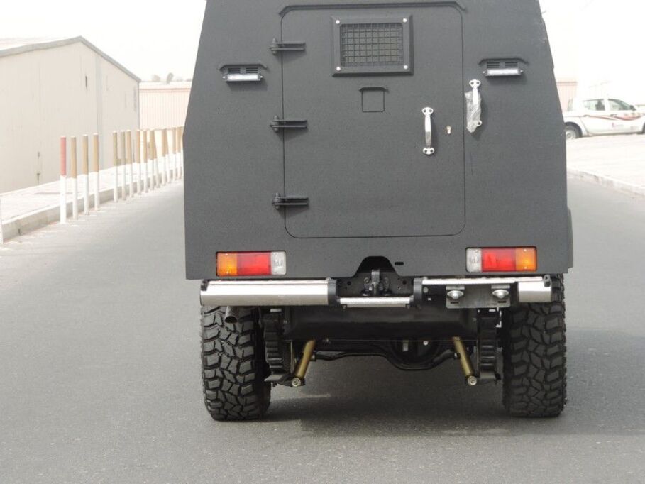 Rear security door with ventilation grille and heavy-duty locks on LC79 Vault