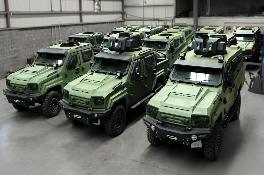 GER 1D MRAP production line with armored green tactical vehicles