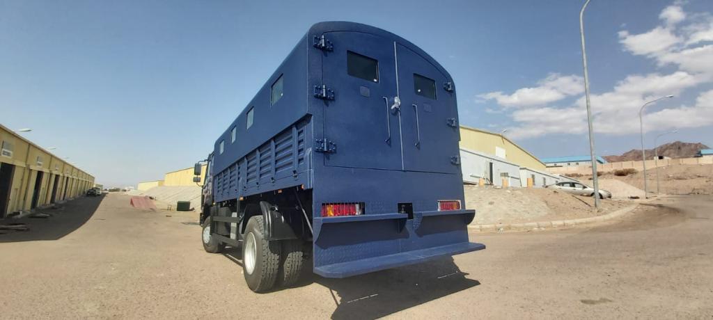 Troop Carrier Truck - TCT BR6 blindé - vue arrière, côté gauche, angle trois-quarts, sièges passagers