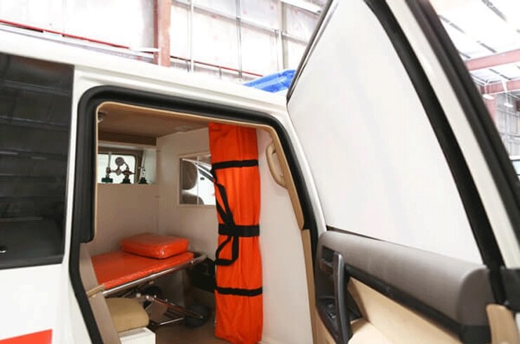 Toyota Land Cruiser armored ambulance passenger door open view