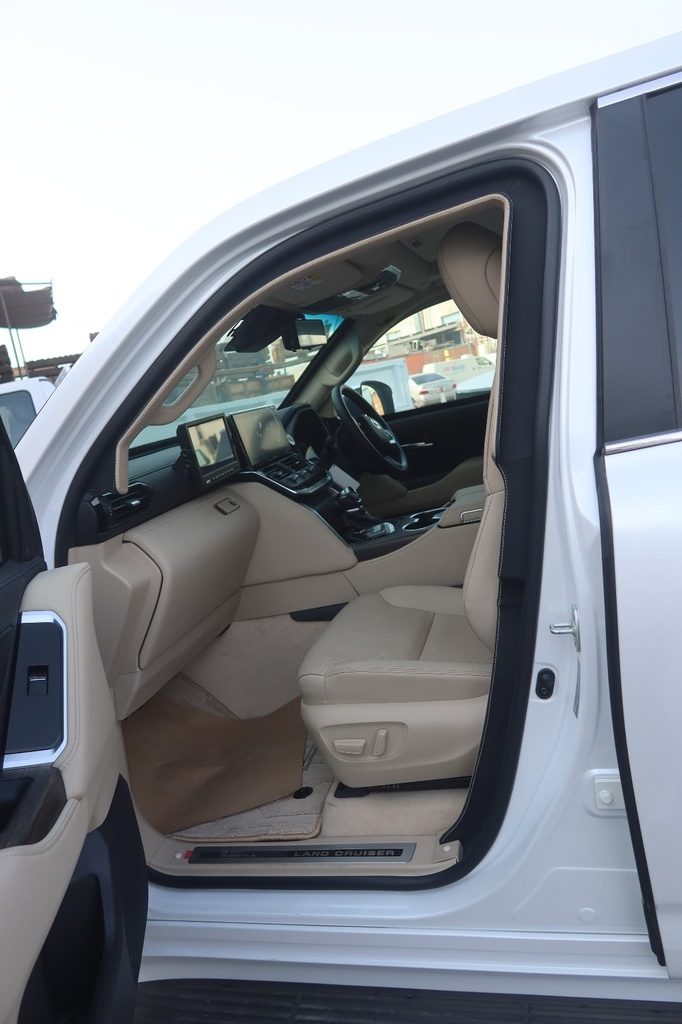 Toyota Land Cruiser ZX front cabin with premium dashboard and seating layout