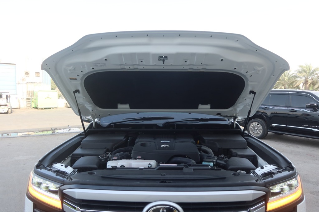 Toyota Land Cruiser ZX hood raised showing V8 engine compartment