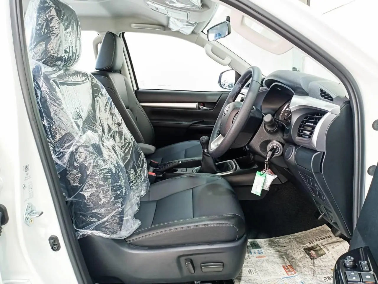 Toyota RHD Hilux 2.8L DC armored pickup driver seat view