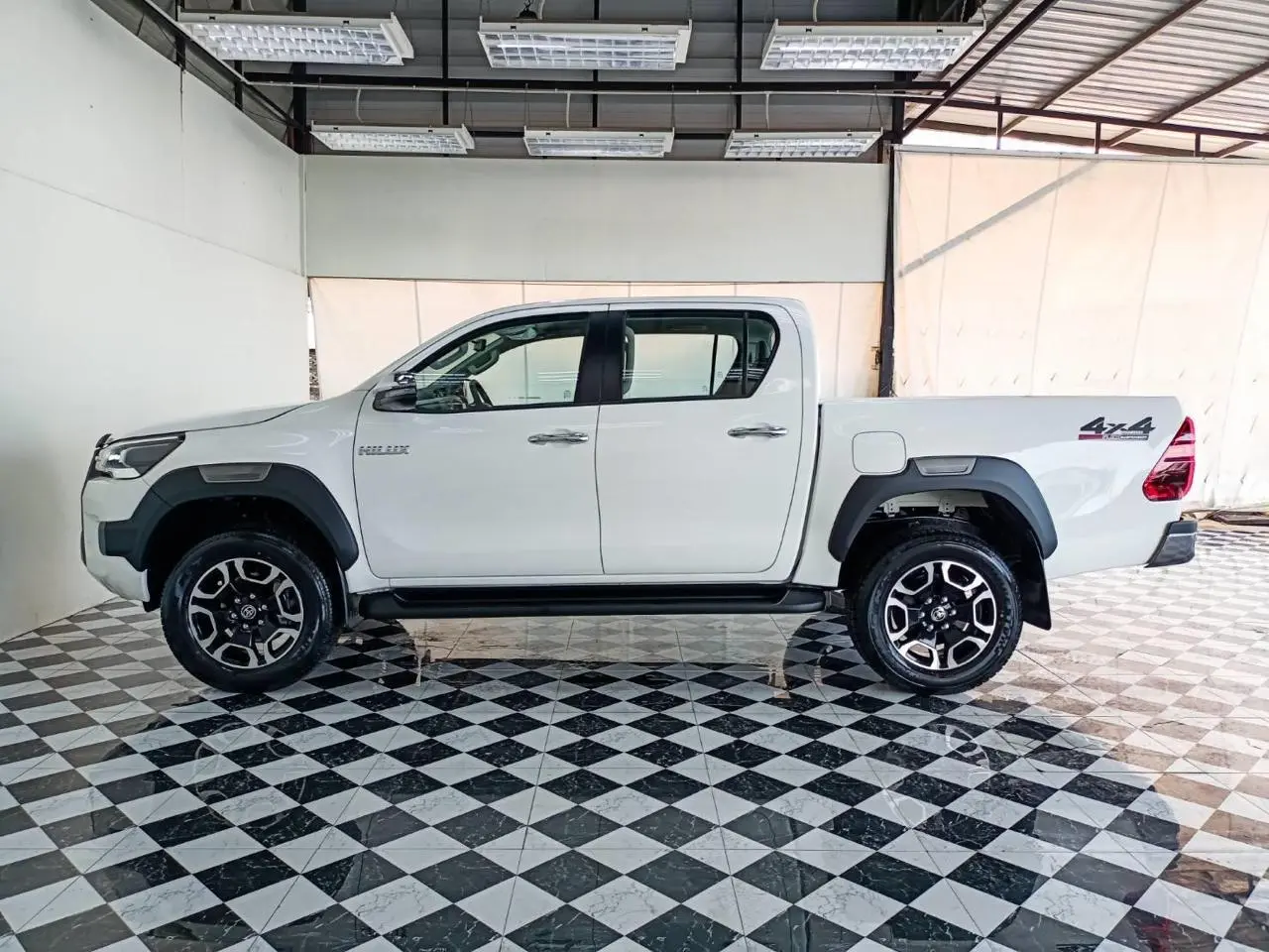 Toyota RHD Hilux 2.8L DC armored pickup full left side view