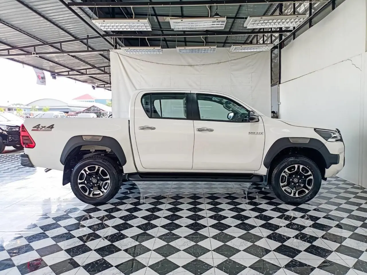 Toyota RHD Hilux 2.8L DC armored pickup full right side view