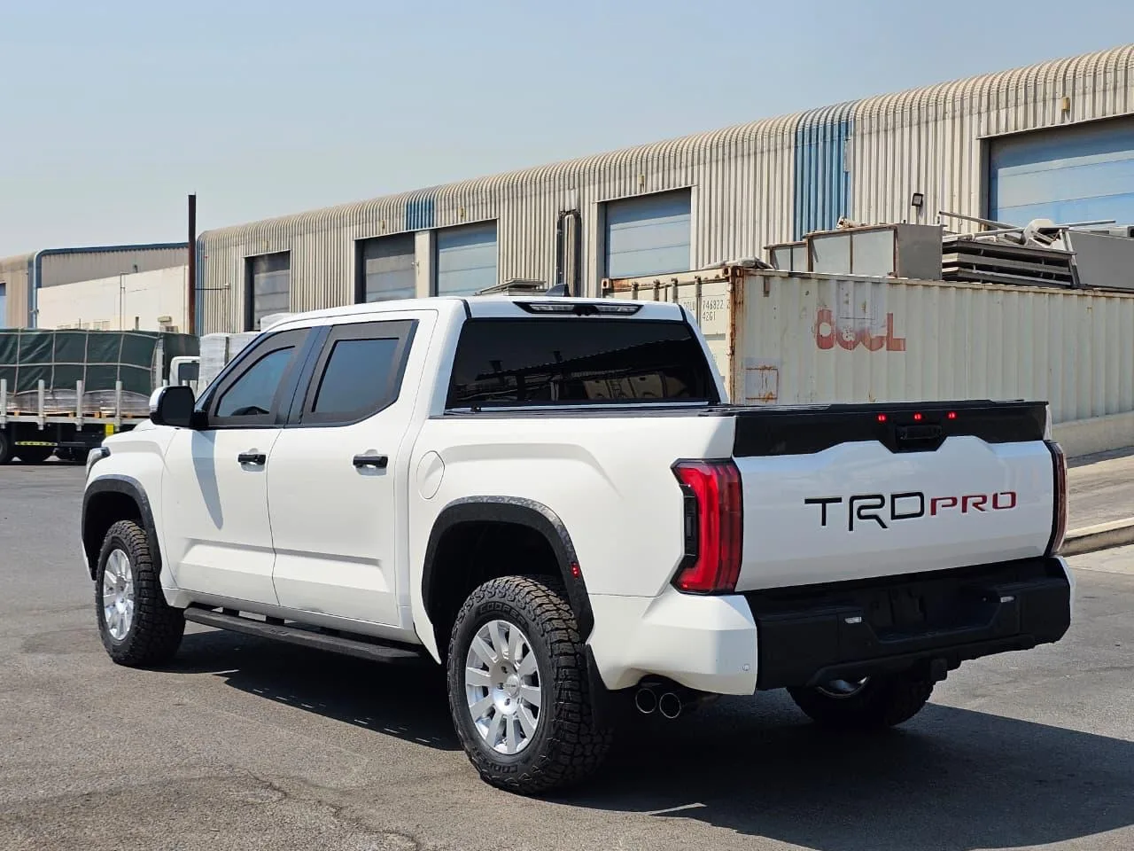 White 2027 Toyota Tundra BR7 armored pickup shown from the rear left side
