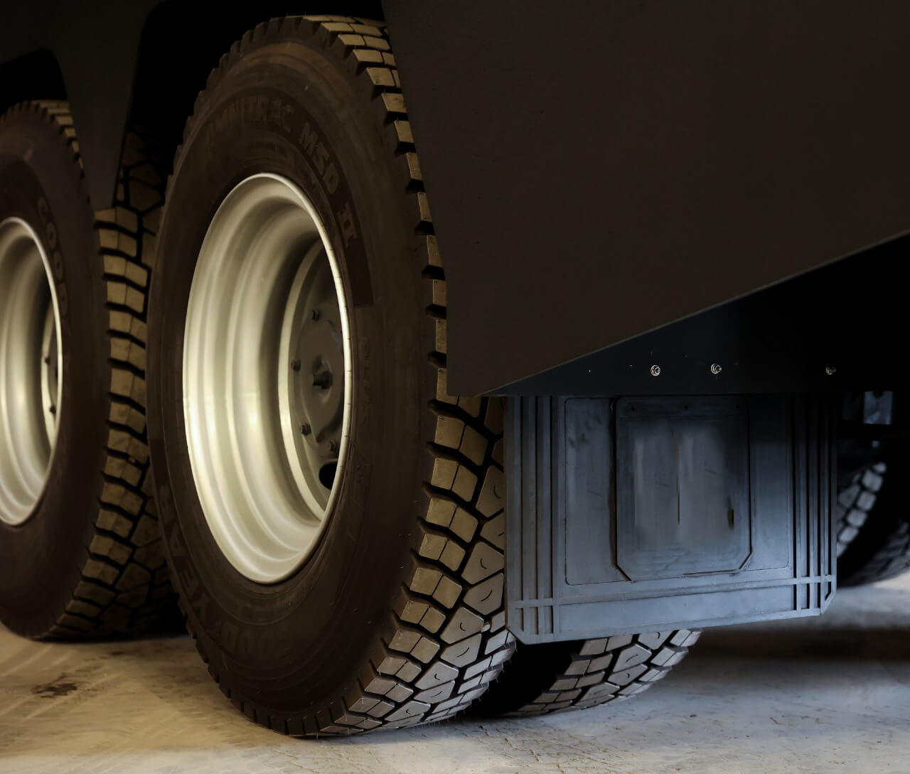 Central Bank CIT tires and mud flaps on armored cash transport build