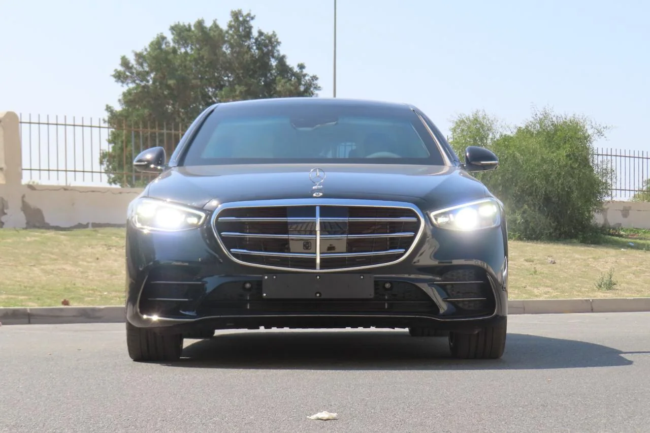Mercedes-Benz S500 armored luxury sedan front exterior lights on