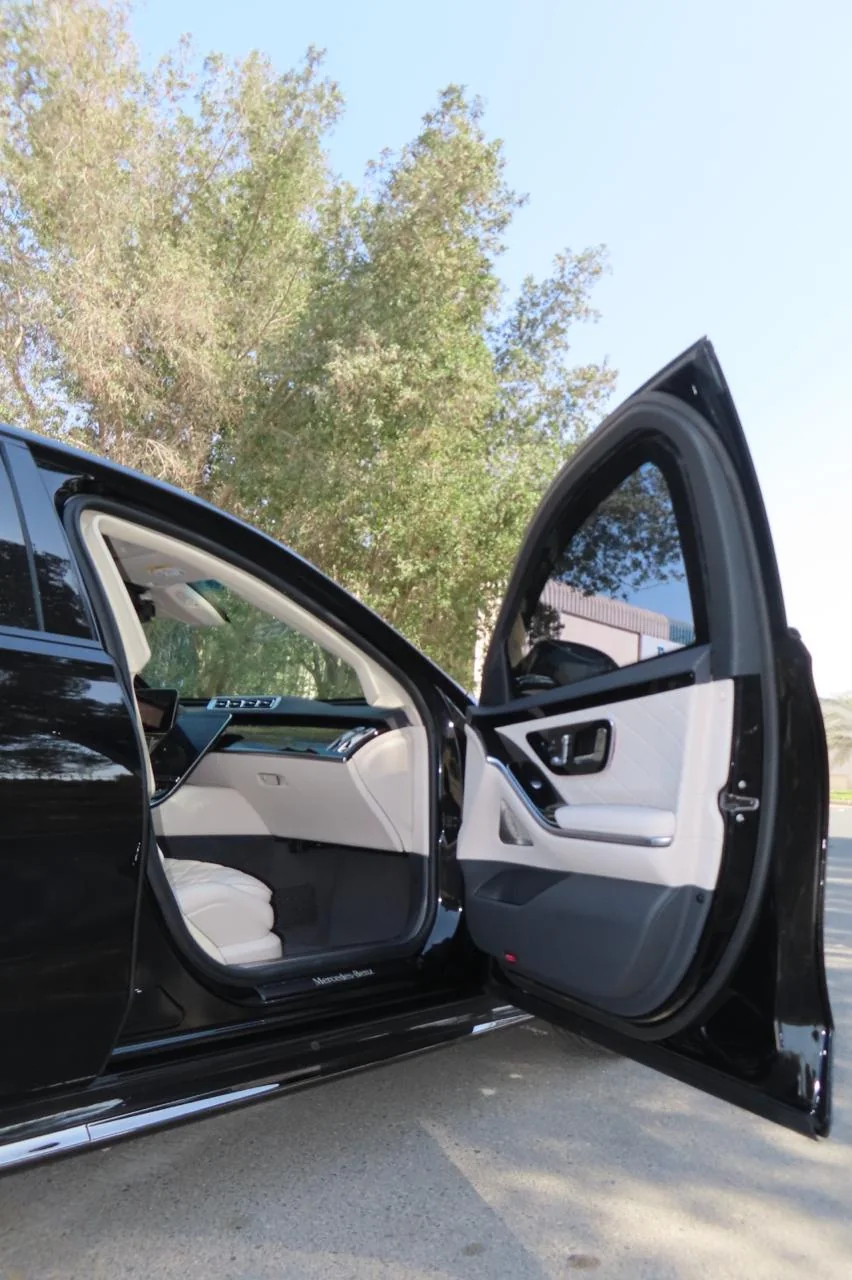 Mercedes-Benz S500 armored luxury sedan front passenger door interior